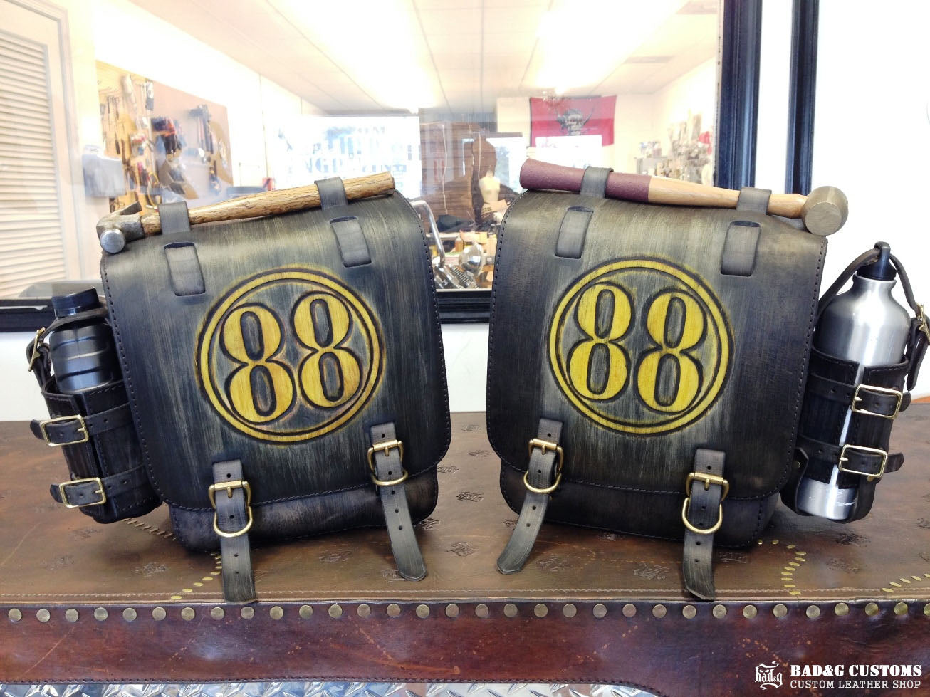 We’re proud to showcase a custom-made seat and saddlebags set crafted specifically for Doug Wothke, the legendary round-the-world motorcycle traveler. Made from hand-tooled and antiqued veg-tan leather, this set took countless hours of expert craftsmanship to complete. Designed for both durability and vintage authenticity, it will accompany him on the 2014 Cannonball Motorcycle Race, as he tackles this grueling challenge aboard his classic Harley-Davidson JD motorcycle. A true tribute to adventure!