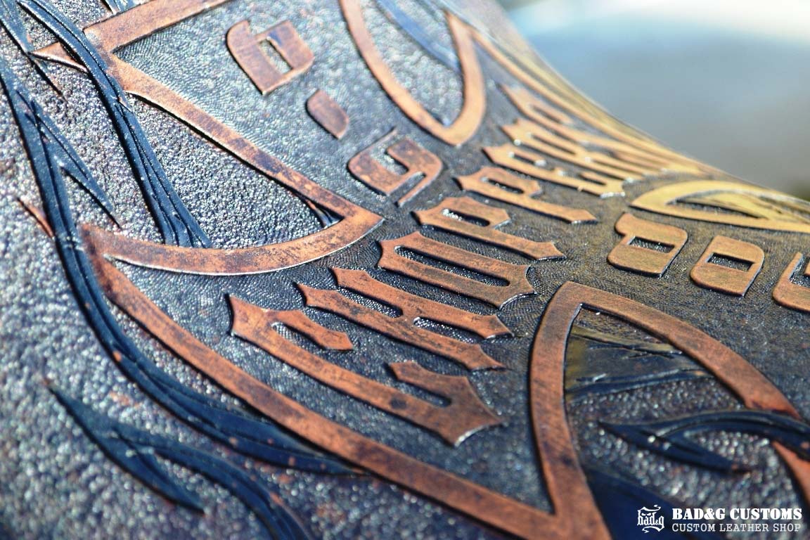 "Big Dog Choppers" logo design hand tooled and braided. Antiqued Blue Veg tan leather with kangaroo lace. West Coast Choppers for Life!